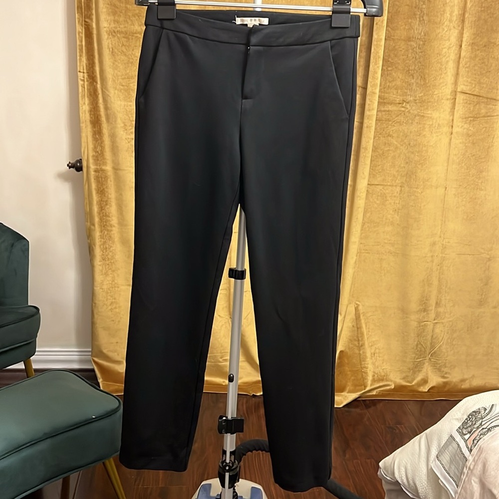 Black skinny knitted pants.